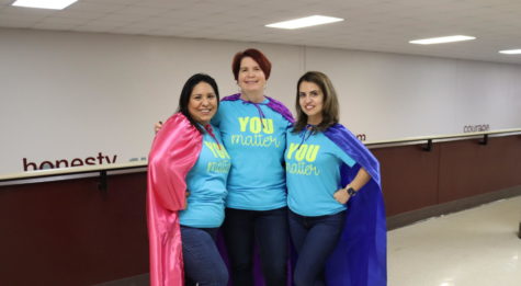Anne Styler, Laura Garcia, Carla Mendez stand next each other to show that being a counselor is a super power.