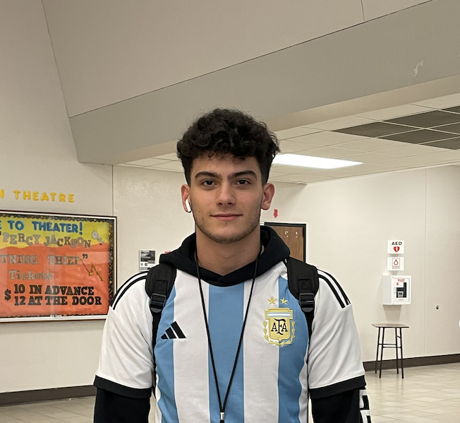 Ezequiel Diaz (Zeke) poses with his Argentina soccer jersey at school during the 2022 World Cup.