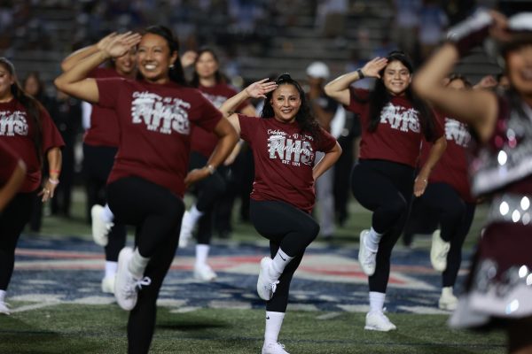 Bandoleras from different eras performed during the 50th Homecoming Game on September 13.