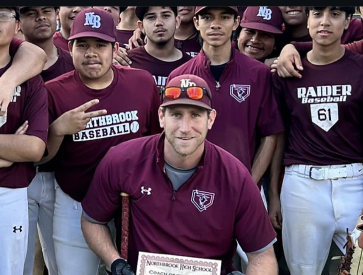 Coach Burger receives Coach of the Month during the Spring 2025 baseball season.