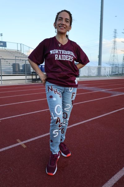 Ms. Valencia showing off her senior jeans during Senior Sunrise.